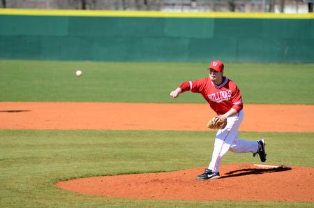 Benjie Fesmire pitches during a double-header against Taylor University. The Bulldogs won three of four games in the weekend series.  - Photo by Anne Richoux
