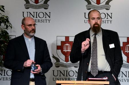 Micah Watson, director of the center for politics and religion, asks for questions from the audience following a lecture from Peter Leithart (left), senior theology scholar at New Saint Andrews College in Moscow, Idaho.  - Photo by Anne Richoux