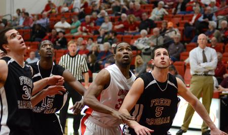Samuel Danache looks for a rebound during the opening round of the TranSouth Athletic Conference Championship against Freed Hardeman University. - Photo by Jacob Moore