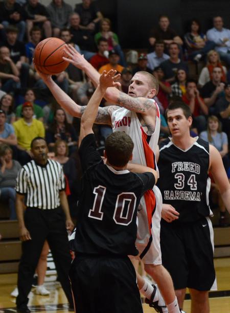 David Lane goes up for a shot during the opening round of the TranSouth Athletic Conference Championship against Freed Hardeman University. - Photo by Jacob Moore