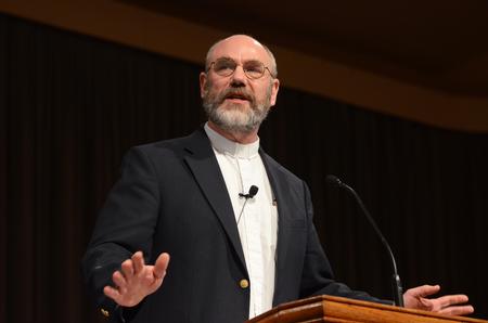 Peter Leithart, senior fellow of theology at New Saint Andrews College, speaks in chapel about the importance of receiving gifts from God and sharing it with others. - Photo by Zac Calvert