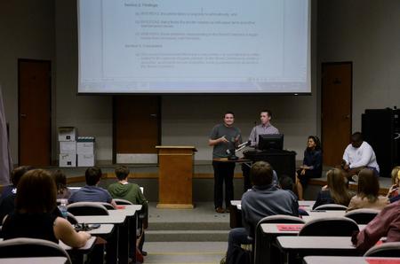Wil Story, junior psychology major, talks about a proposed bill during Student Senate meeting. - Photo by Anne Richoux
