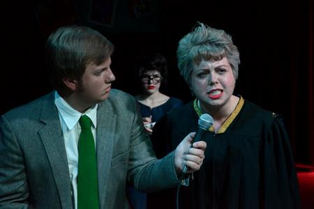 Jacob Melder, junior broadcast journalism major, and Jillian Barron, senior French and theatre/speech double major, perform a scene from Friedrich Dürrenmatt's <em>The Visit</em>. - Photo by Jacob Moore