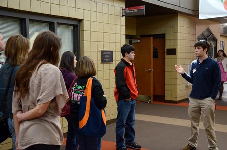 Andy Seaton, senior Christian studies major and Union ambassador, guides a group of perspective students through the Student Union Building. - Photo by Ebbie Davis