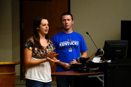 Holly Harris, sophomore nursing major, tells students about a proposed bill during Student Senate. - Photo by Anne Richoux