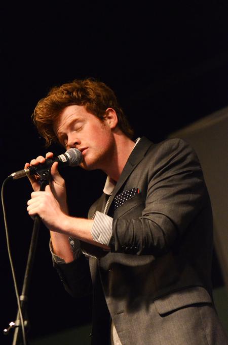 Vinyl Thief's lead singer, Grayson Proctor, sings for students in a Barefoots Joe concert. - Photo by Zac Calvert