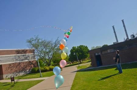 Love was evident on Union's campus Monday morning with a Art Dept., display of more than 1,600 balloons and 2,000 feet of line.  Lee Benson and 20 art students helped make it happen. The line of balloons stretched over the campus for two hours.  - Photo by Morris Abernathy