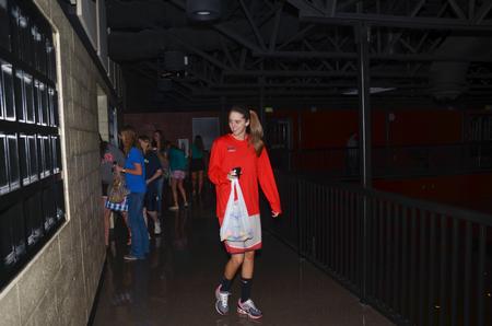 Paige Parker, sophomore elementary education major, searches for eggs during Eggstravaganza, a Residence Life event in the Bowld Student Commons. - Photo by Zac Calvert