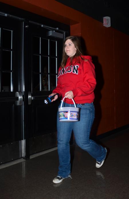 Jill Miller, sophomore public relations major, takes part in Residence Life's Eggstravaganza event in the Bowld Student Commons. Participants searched for eggs filled with raffle tickets and candy. - Photo by Zac Calvert