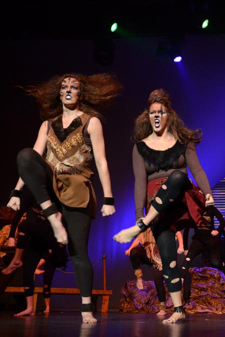 Sisters Katie Parks, freshman nursing major, and Libby Parks, senior nursing major, play the characters of Simba and Scar from "The Lion King" during Chi Omega's performance at the 15th annual Variety Show. - Photo by Jacob Moore