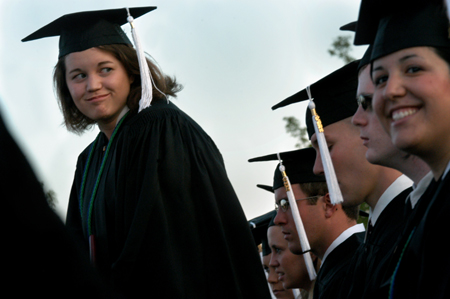 Journalism graduate Katie Gould is recognized for the Academic Achievement Award at spring commencement. - Photo by Jonathan Blair