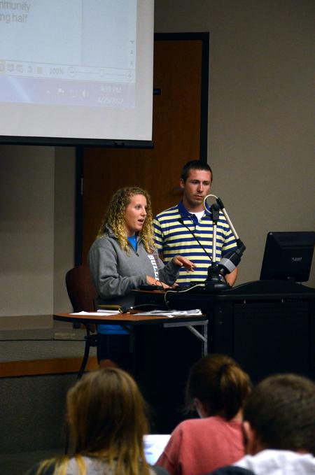 Kara Kitchens, senior athletic training major, tells students about a proposed bill during Student Senate.  - Photo by Anne Richoux