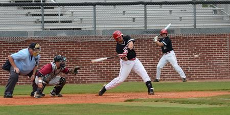 Doug Joyce, senior sports management major, swings during a TransSouth Conference Tournament game against Cumberland University. The Union bulldogs won 4-2 to advance to the second round. - Photo by Jacob Moore