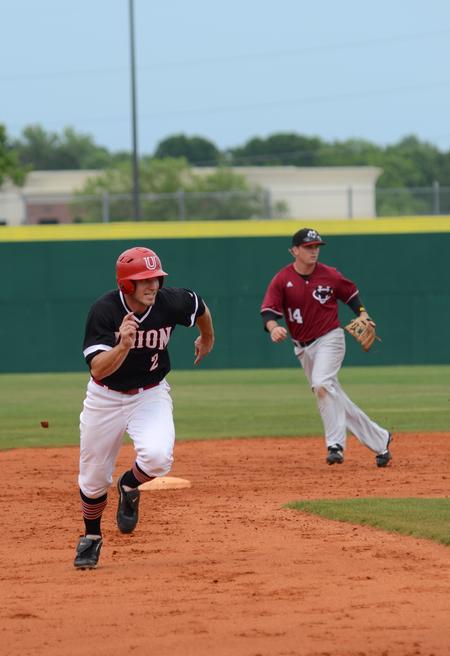 Kian Jost, senior mechanical engineering major, runs for third base during a game against Cumberland University in the TransSouth Conference Tournament. - Photo by Jacob Moore