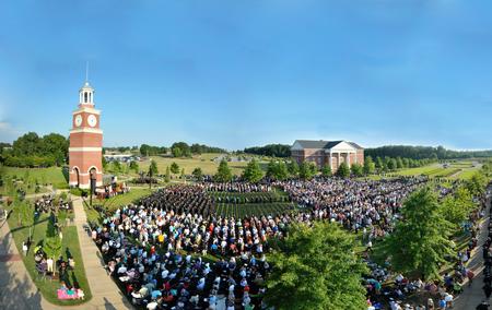 Graduates, their family and friends, and Union employees fill the Great Lawn during spring graduation. - Photo by Morris Abernathy