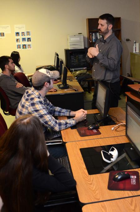 Cam Tracy, web development agent, teaches a digital media studies class.  - Photo by Jacob Moore