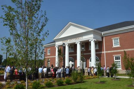 A large crowd gathers outside of the new Hendersonville facility for the building dedication ceremony. - Photo by Morris Abernathy