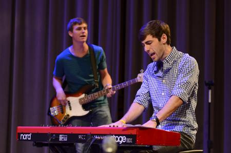 Bradford Carrington, associate worship leader at Englewood Baptist Church and Union alum, leads music with Andrew Key, junior broadcast journalism major, during a chapel service for new students and their families. - Photo by Jacob Moore