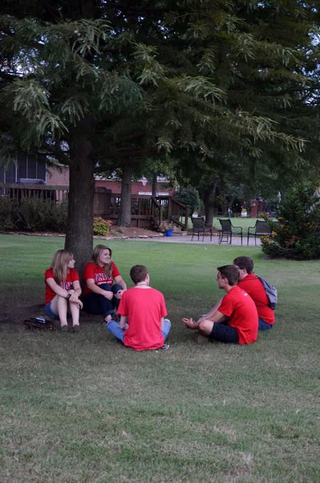 New students enjoy an ice cream social at the home of David and Lanese Dockery, president and first lady of the university.  - Photo by Anne Richoux