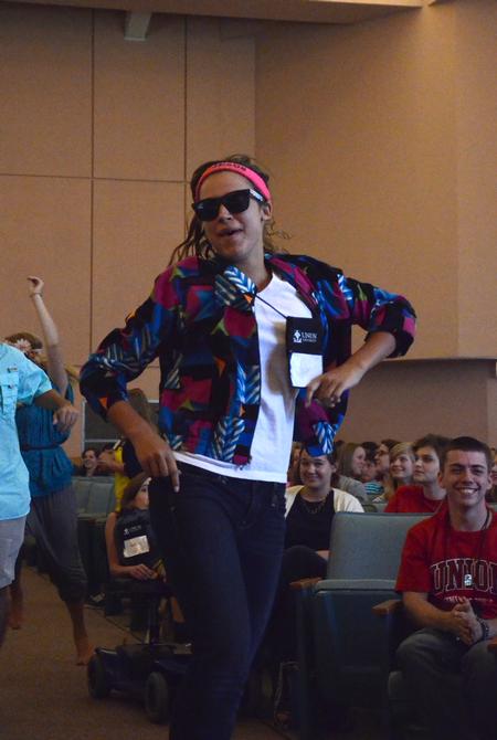 Chelsea Meiss, sophomore intercultural studies major, dances with the rest of the resident advisors during Focus week.
 - Photo by Zac Calvert