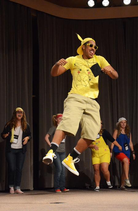 Matt Arnold, junior christian studies major, jumps in the air as he is introduced to the new students during Focus week. - Photo by Zac Calvert