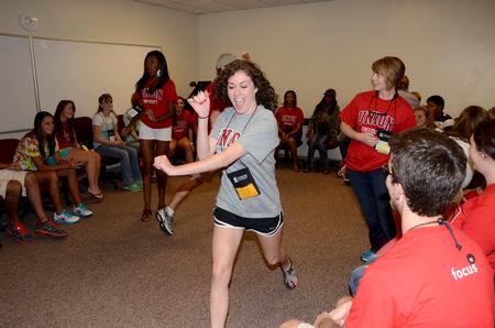Hannah Strickland, senior Focus Leader, plays the icebreaker game "Never Have I Ever" with her Focus group.  - Photo by Ebbie Davis