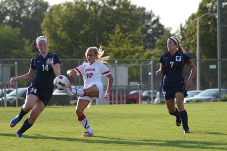 Lady Bulldog Elizabeth Clark keeps the ball away from Melissa Patchin and Melissa Turney of Missouri Baptist during a home soccer game. - Photo by Jacob Moore