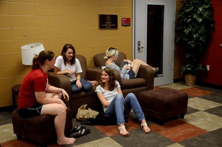Ally Norton, Charlotte Pratt and Ruth Bone take some time to relax and talk during Ladies Night in the Bowld Student Commons.  - Photo by Anne Richoux