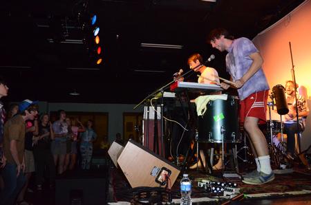 The band Wolvski, made up of several Union students, performs and energetic song at Barefoots Joe. - Photo by Zac Calvert