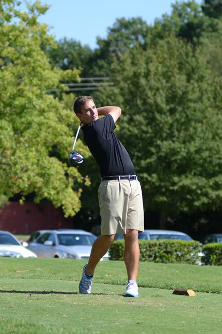 Ben Waits practices with his fellow golf team members at the Country Club of Jackson. - Photo by Jacob Moore
