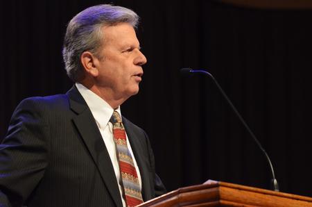 Walton Padelford, university professor of economics, speaks in chapel about the dangers of a lukewarm church and how we need to open a door to Christ, and in turn He will open doors for us. - Photo by Zac Calvert