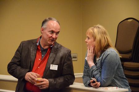 Jerry Tidwell, senior vice president for university relations, speaks to Kimberly Thornbury, senior vice president for student services and dean of students, during the President's Brunch, a Family Weekend activity. - Photo by Zac Calvert
