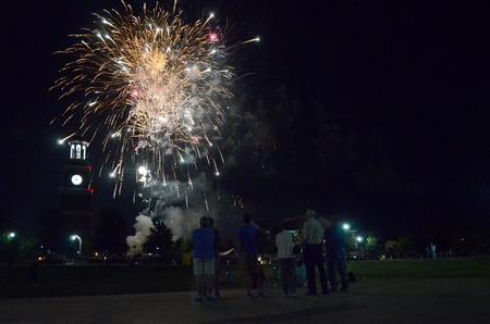 Students, families, and alumni enjoy the fireworks show at Union Night during Family Weekend. - Photo by Anne Richoux