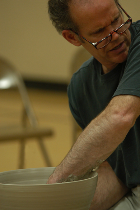 Artist Chris Staley answers a student's question during a ceramics workshop on Union's campus. - Photo by Jonathan Blair
