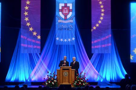 President David S. Dockery asks follow-up questions to Robert M. Gates, former U.S. secretary of defense, at the 15th Annual Scholarship Banquet held at the Carl Perkins Civic Center.   - Photo by Ebbie Davis