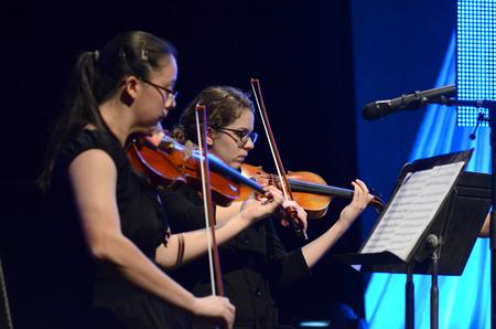 Paige Tang and other members of the string ensemble provided dinner music at the 15th Annual Scholarship Banquet. - Photo by Jacob Moore