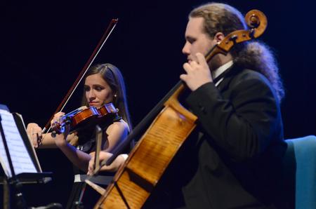 Music majors Erika Sutton, Cameron Mathenia and other members of the string ensemble provided dinner music at the 15th Annual Scholarship Banquet. - Photo by Jacob Moore