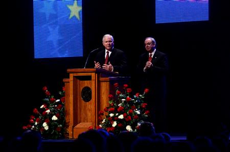 Former Secretary of Defense Robert M. Gates answers a question asked by President David S. Dockery during the 15th Annual Scholarship Banquet.  - Photo by Anne Richoux