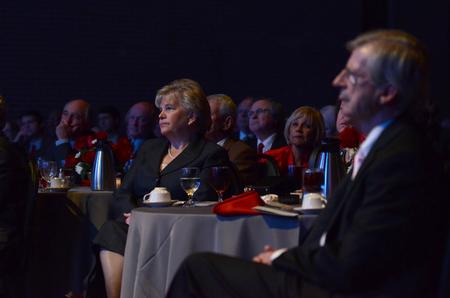 Lanese Dockery, first lady of the university, listens to Robert M. Gates answer questions from the audience during the 15th Annual Scholarship Banquet.  - Photo by Jacob Moore