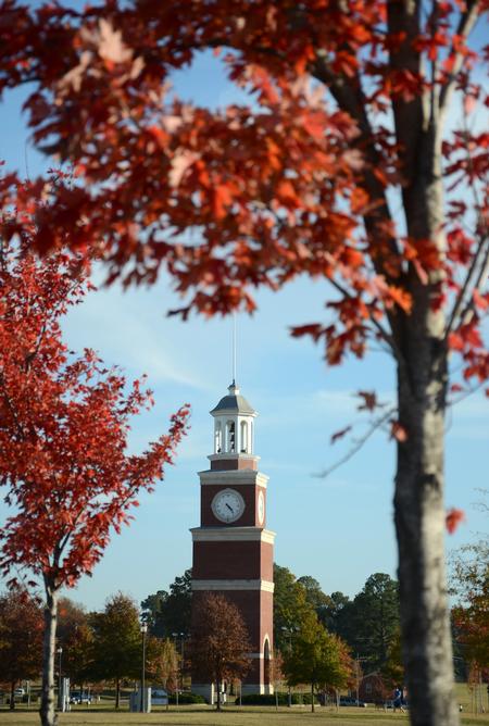 Miller Tower is framed by the gorgeous Fall foliage on campus.  - Photo by Jacob Moore
