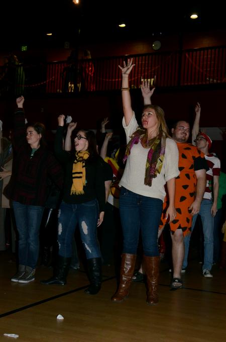 Morgan Roth, sophomore nursing major, dances with other students during Costume Coffee House in the Bowld Student Commons. - Photo by Anne Richoux