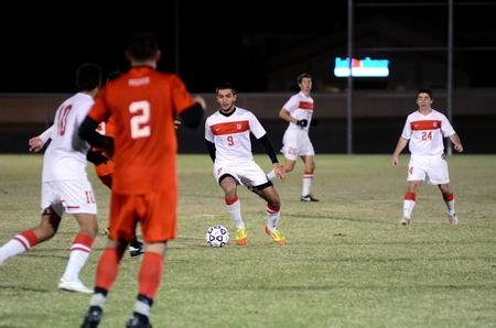 Guilherme Reis dribbles down field during Union's game against Tennessee Temple University for the semifinal round of the NCCAA mideast region tournament. - Photo by Anne Richoux