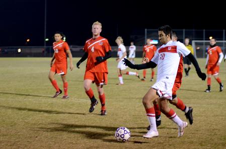 Felipe Araujo attacks the ball during the semifinal round game in the NCCAA mideast region tournament. - Photo by Anne Richoux