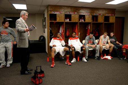 David Niven, head coach, talks with the Bulldog basketball team during half time of their season opener game against Central Baptist College.  - Photo by Anne Richoux