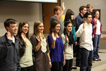 The new officers of the Student Government Association swear in during the first meeting of the semester. - Photo by Matt McDaniel