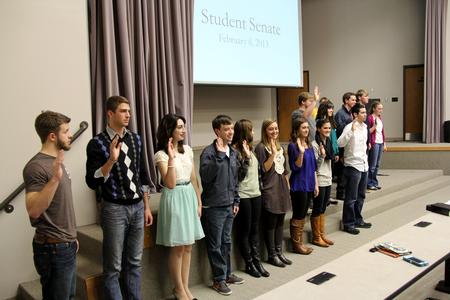 New officers in Student Government Association swear in during the first meeting of the semester. - Photo by Matt McDaniel