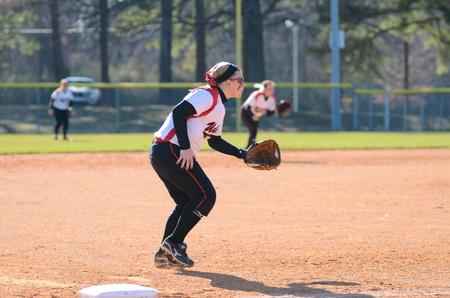 Lady Bulldog softball players stand ready for a hit from a Bethel University player during a double-header at Fesmire Field.  - Photo by Anne Richoux