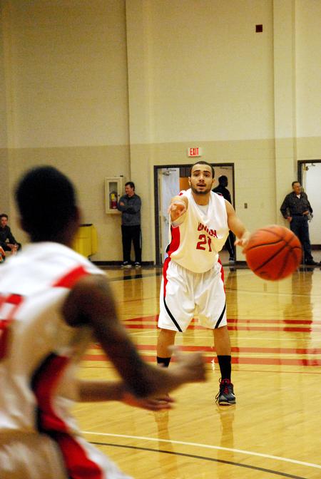 Pedro Faller throws the ball to a teammate during a game against  Christian Brothers University. - Photo by Anne Richoux