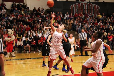 Emily Sissom goes in for the lay up in the homecoming game against Shorter University. - Photo by Matt McDaniel