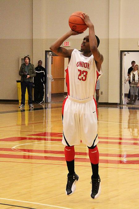 Corieon Pearson takes an open jump shot in the homecoming game against the Shorter University Hawks. - Photo by Matt McDaniel